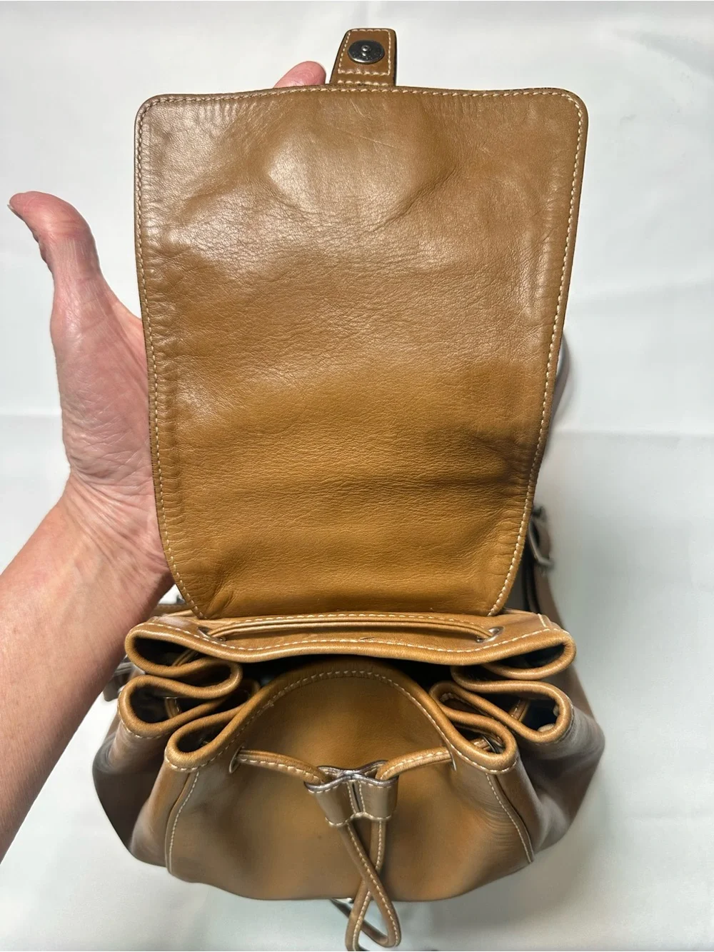 Vintage Coach British Tan Soft Leather Drawstring Backpack with Buckle Flap